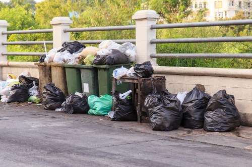 Workers segregating construction waste materials