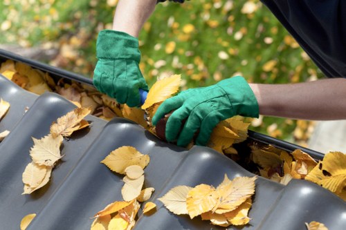 Volunteers and charity partners collecting reusable items from skips